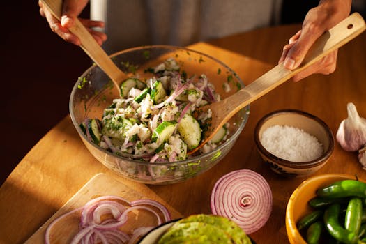 a bowl of colorful fermented vegetables on a kitchen table