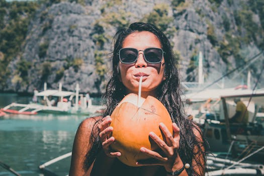 image of a woman drinking water while pregnant